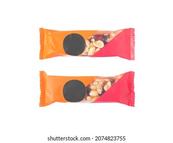 Energy bars with nuts and dried fruit isolated on white background. High protein snack for sport