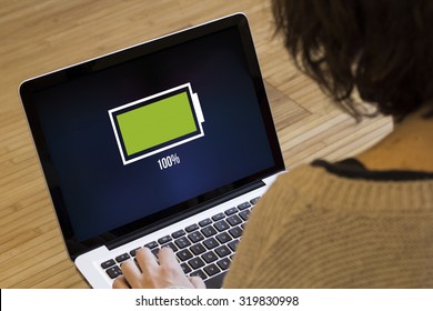 energy concept: full battery on a laptop screen. Screen graphics are made up.