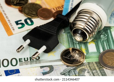 Energy costs and electricity prices. Electricity consumption concept. Euro Banknotes Energy Saving 