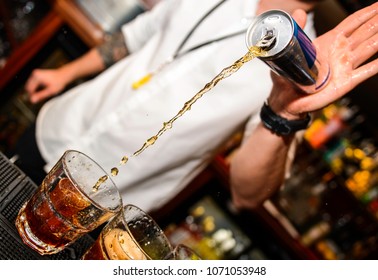 Energy drink being poured at a bar
