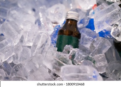 Energy Drinks Immersed In Ice In The Cooler.