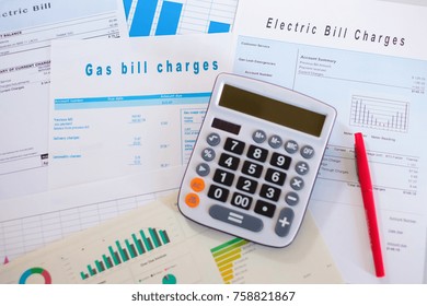 Energy efficiency concept with charges invoice documents on desk