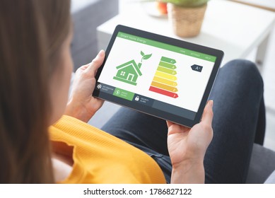 Energy efficiency mobile app on screen. Ecology, eco house concept - Powered by Shutterstock