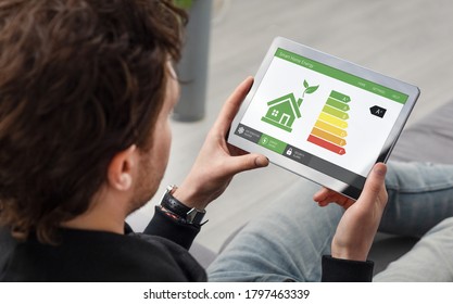 Energy efficiency mobile app on screen. Ecology, eco house concept - Powered by Shutterstock