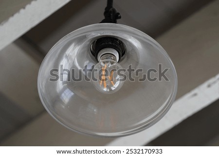 Energy efficient ceiling light turned on and turned off. 