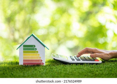 Energy Efficient House Audit Using Calculator. High Efficiency - Shutterstock ID 2176524989