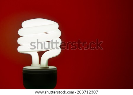 Energy efficient light bulb with red wall