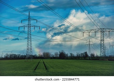 Energy line in front of the wind turbines - Shutterstock ID 2255844771