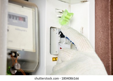 energy meter and electricity switch box indoors. repair and adjust domestic power wires and equipment. electrician repair service concept. - Shutterstock ID 1804086166