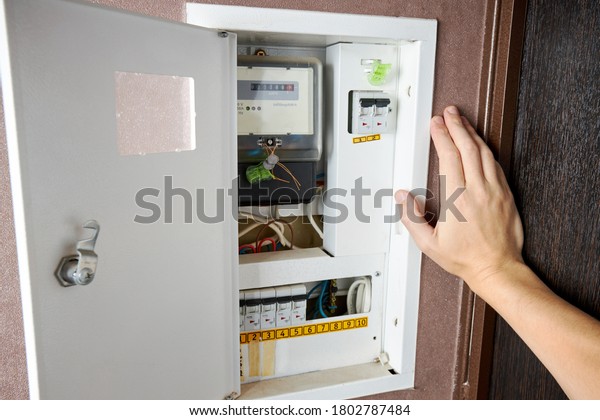 energy meter and electricity switch box indoors.\
repair and adjust domestic power wires and equipment. electrician\
repair service concept.