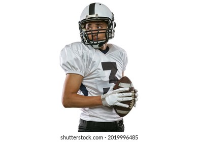 Energy, power, strength. Close-up portrait of American football player in sports equipment, helmet and gloves isolated on white studio background. Concept of sport, movement, achievements. Copy space