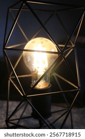 Energy saving electricity by using low wattage, modern and minimalist style lamp with soft yellow light.