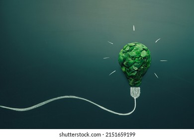 energy saving light bulb made with green leaves. Minimal nature concept. Think green. Ecology concept. Environmentally friendly planet. Copy space - Shutterstock ID 2151659199