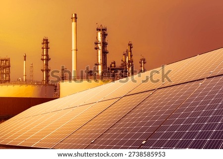Energy security. Solar panel- Renewable energy for Oil refinery plant from industry zone, large Oil and gas petrochemical industrial, Refinery factory oil storage tank and pipeline.