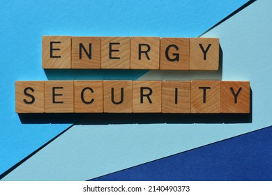 Energy Security, Words In Wooden Alphabet Letters Isolated On Blue Background