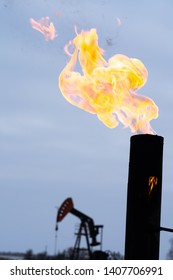 Energy Wasted And Environment Harmed Natural Gas Is Burned Off From Every Site In The North Dakota Bakken Oil Fields Image Is The Flames Of Wasted Energy And A Carbon Footprint Left  