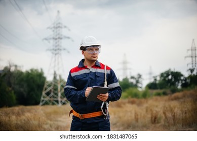 An Energy Worker Inspects Power Lines. Energy