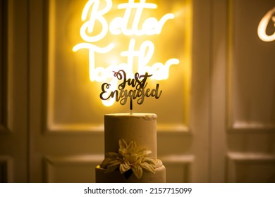 engaged celebration cake better together light background