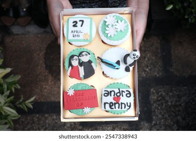 Engaged Couple Cupcakes with Personalized Decorations - Powered by Shutterstock