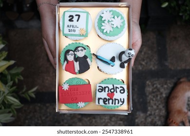 Engaged Couple Cupcakes with Personalized Decorations - Powered by Shutterstock