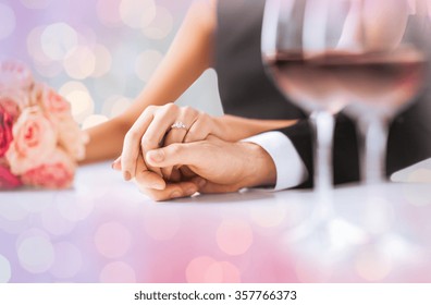 Engaged Couple Holding Hands