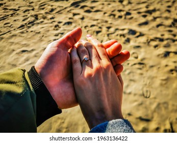 Engagement Moment When Girl Says Yes At A Beach In Front Of Sea, Eaves And Horizon