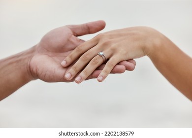 Engagement ring, hands and proposal of engaged couple romantic marriage celebration. Zoom on diamond jewelry finger for love, save the date and announcement of special occasion in commitment together - Powered by Shutterstock