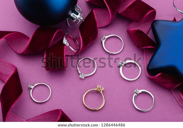 Engagement Rings Diamonds On Purple Background Stock Photo Edit