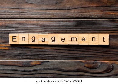 Engagement Word Written On Wood Block. Engagement Text On Table, Concept.