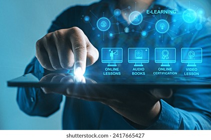 Engaging with Diverse E-Learning Opportunities on Tablet :An individual taps into a variety of e-learning options on a tablet, highlighting the diverse educational content available digitally. - Powered by Shutterstock