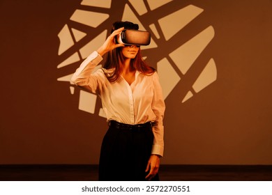 Engaging in virtual reality experience with VR glasses in a colorful digital environment