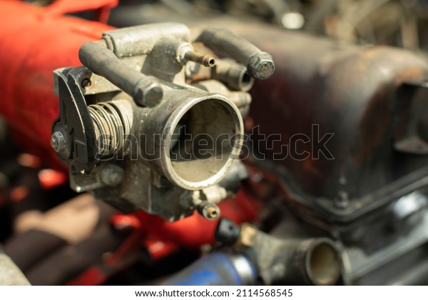 Engine of car. Transport\
details. Gasoline engine under hood. Sports car. Connecting units\
of mechanism.