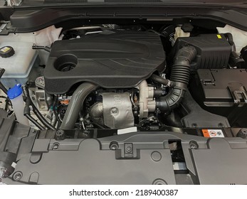 The engine compartment of the car, a view of the engine. Four-cylinder engine