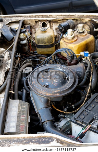 engine\
compartment of an old Soviet car Lada\
(Zhiguli).