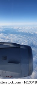 The Engine Cover Of An Aircraft In The Sky