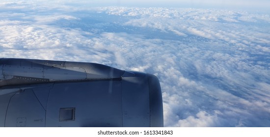 The Engine Cover Of An Aircraft In The Sky