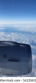 The Engine Cover Of An Aircraft In The Sky