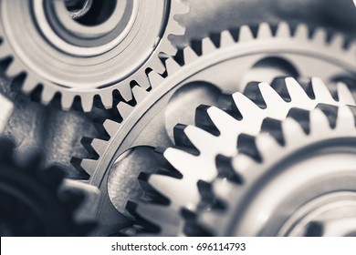 engine gear wheels, industrial background - Shutterstock ID 696114793