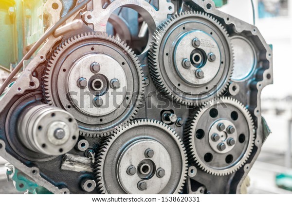 Engine gears in a repair\
shop