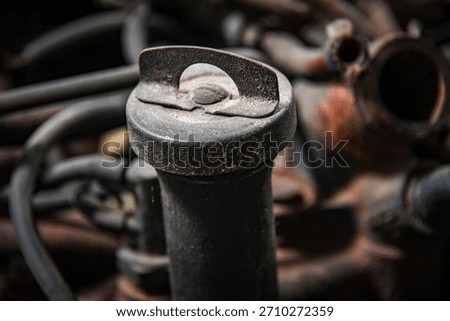 Engine oil cap macro shot of truck.