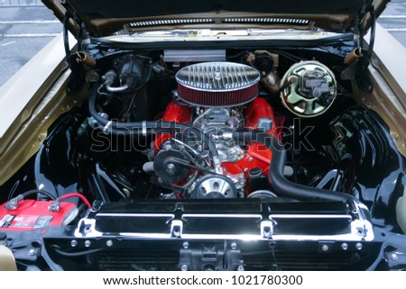 The engine of the old car, the bonnet is open