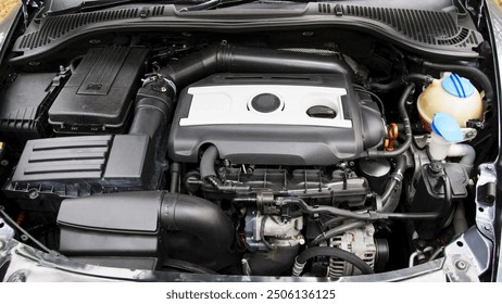 engine, open hood of a sports car. breakdown, repair. battery car engine detail motor. close-up of machine new engine checking car battery cleaning for, car service. auto motor - Powered by Shutterstock