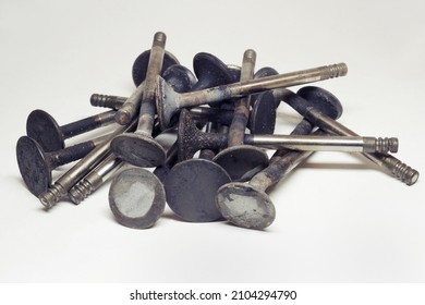 Engine Poppet Steel Valves. Heap Of Worn Change Part Of Reciprocating Engine Of Sixteen Valve Motor Car