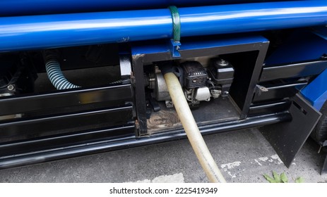 The Engine Of The Refillable Water Car That Is Directly Connected To The Seller's Water Storage Tank