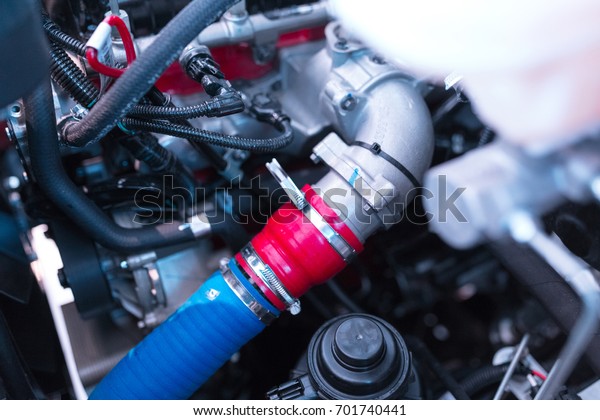 Engine repair. Checking of a car performance in\
car-care service.
