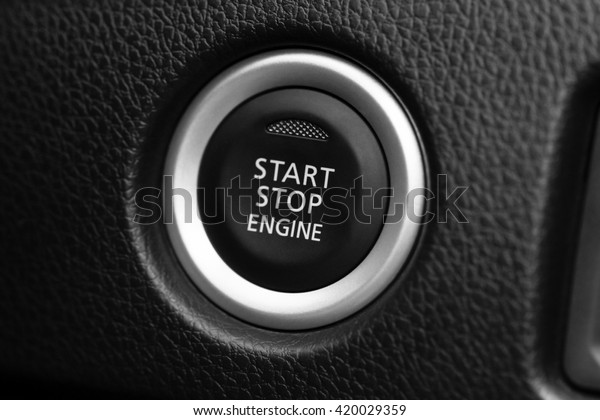 Engine start button\
in car - Black and White