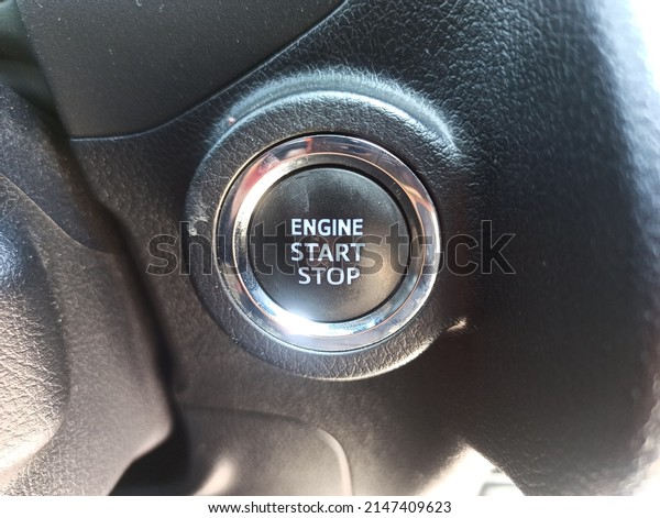 Engine Start\
Button in the car, car ignition button, Engine start button of\
luxury cars, push engine start\
button.
