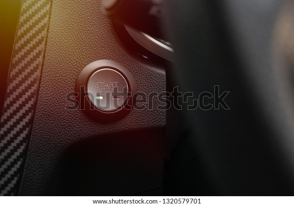 Engine\
start and stop button on Dashboard in The\
Car