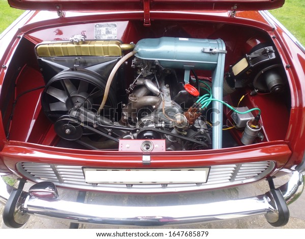 The engine of this beautiful car\
was broken down by the husband and cleaned and\
refolded.