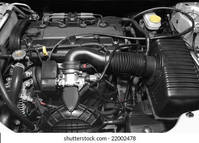 Engine Under The Hood Of A Car